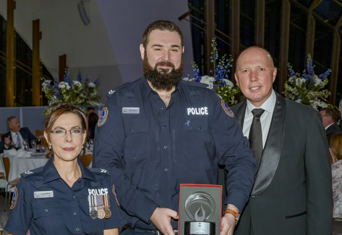 Mark Turner receiving the Bravery Award